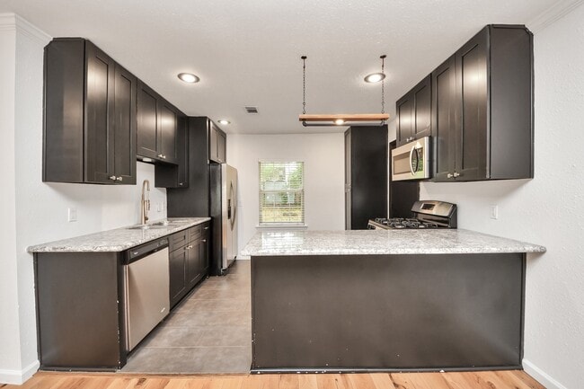Building Photo - 5118 Ditmas Ln