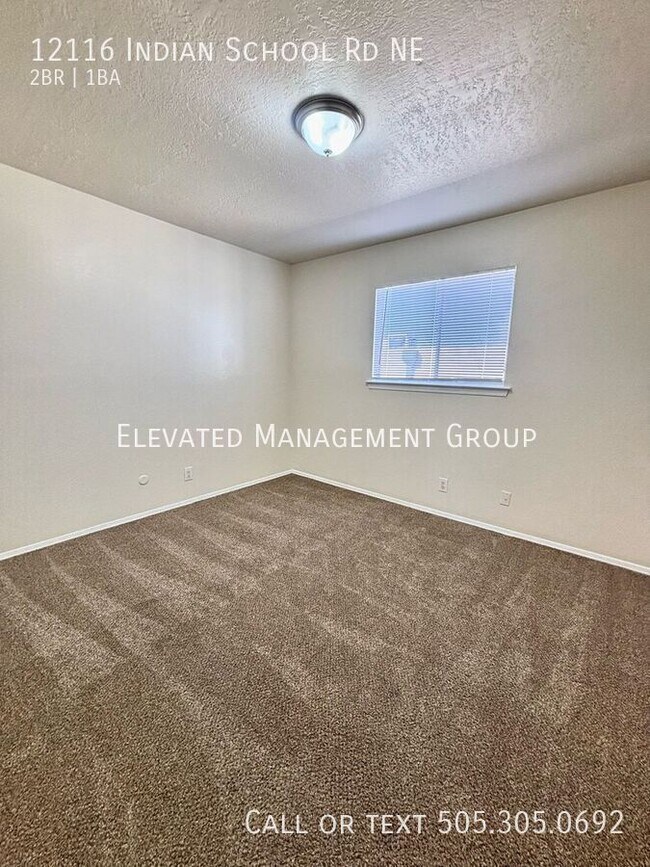 Building Photo - 12116 Indian School Rd NE