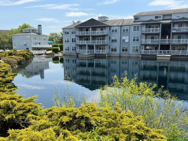 Building Photo - Welcome to Waters Edge Condos!