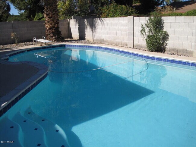 Building Photo - “Spacious 4-bedroom home with private pool in prime Tempe location!”