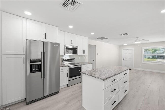 Building Photo - ANNUAL RENTAL - 2 BED / 2 BATH ATTACHED GA...