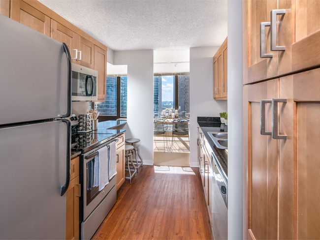 Beautiful kitchens featuring stainless steel appliances! - Columbus Plaza