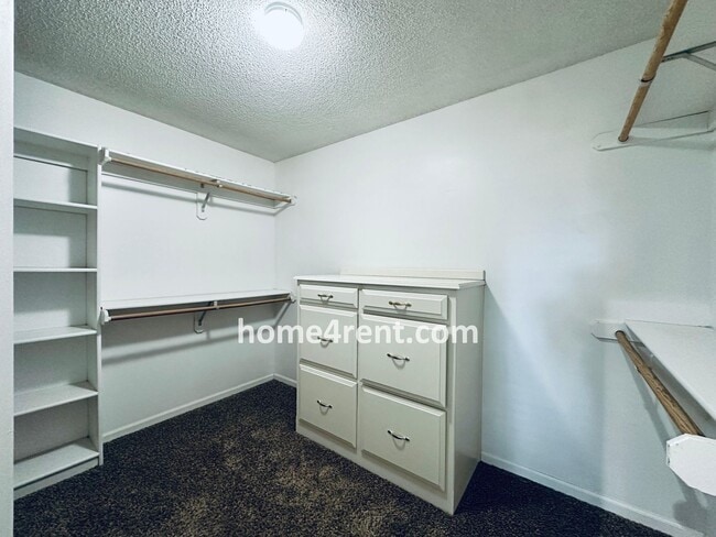 Building Photo - Blue Valley Schools w/ Wood Floors, Finished Basement and a Peaceful, Private Fenced Yard!