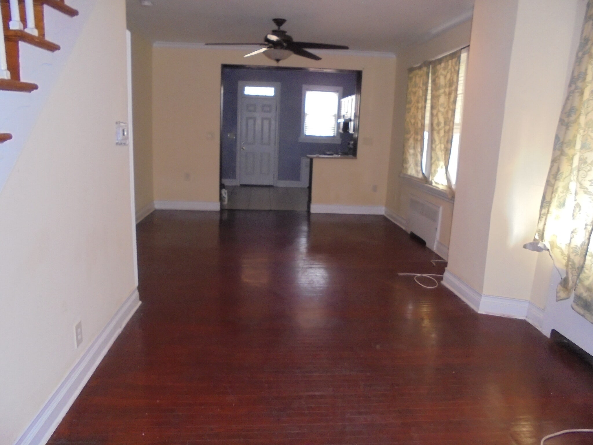 Spacious living/dining room combination with hardwood floors throughout - 1610 Homestead st