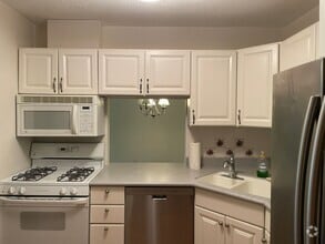 Building Photo - Updated Condo with Modern Comfort & Resort...