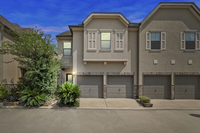 Building Photo - Luxury Townhome with Attached Garage & Outdoor Entertaining Area - $100 off first and second mont!