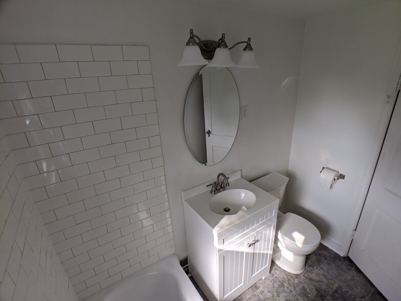 Recently updated fixtures in bathroom - 1315 S Norwood Ave