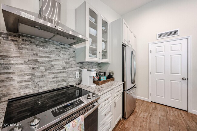 Building Photo - 9085 E Windrose Dr