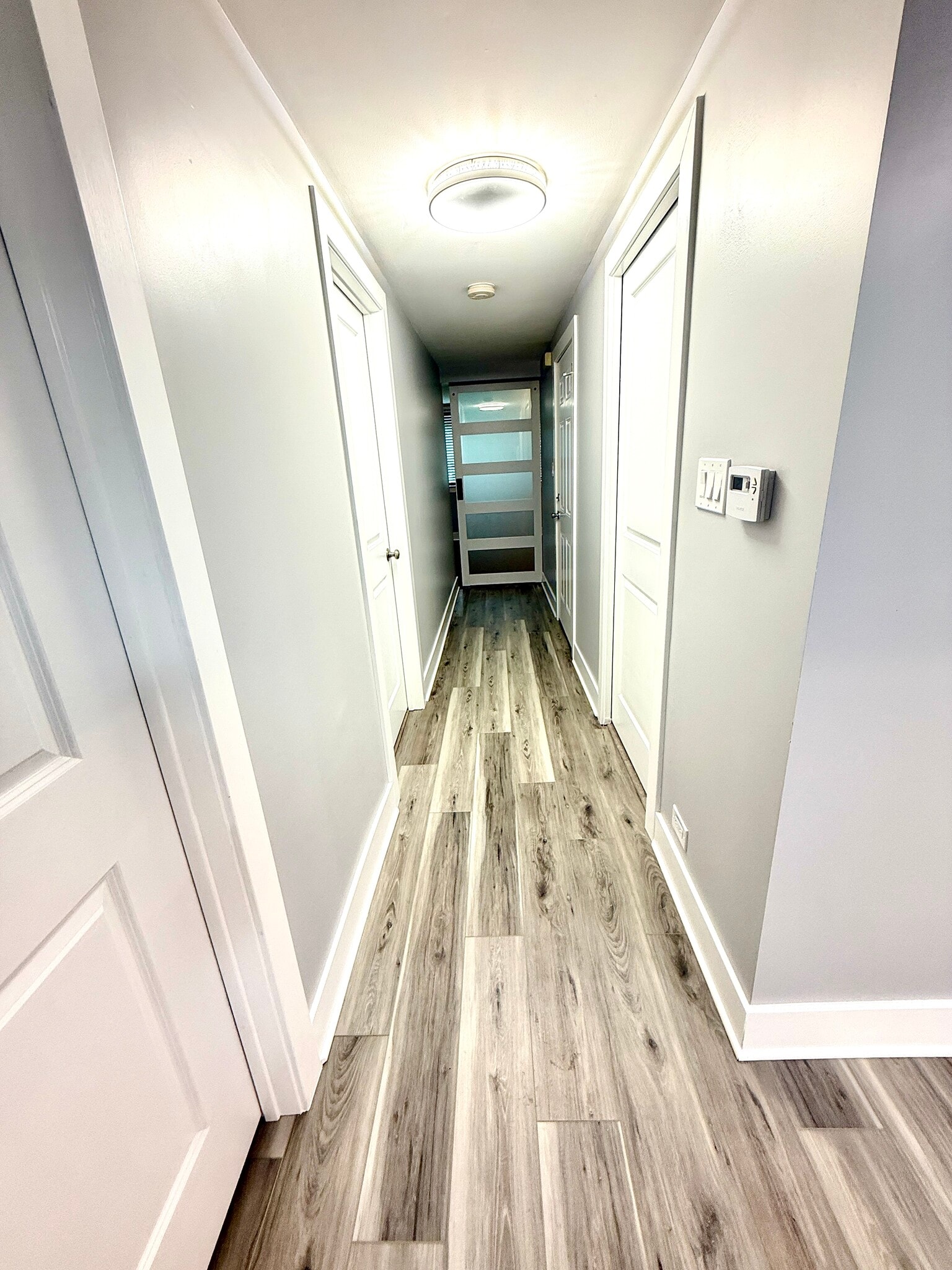 Hallway yo large living room. All doors in apartment are new. - 16W671 56th St