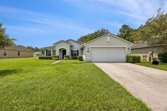 Building Photo - Elegant 4BR Home with Gourmet Kitchen, Smart Tech Package & Nature Views - Coming Soon