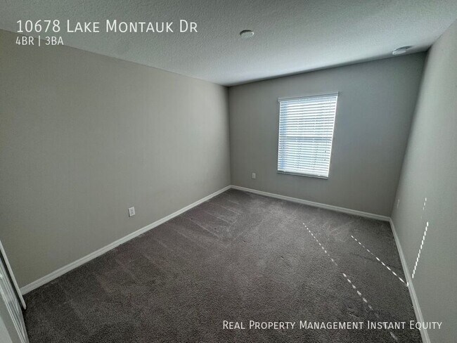 Building Photo - 10678 Lake Montauk Dr