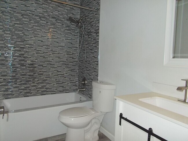 Building Photo - Comfort and Convenience in a Picturesque Gated Community