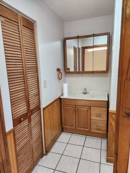 Bathroom vanity, closet to left - 5212 Bertsville Rd