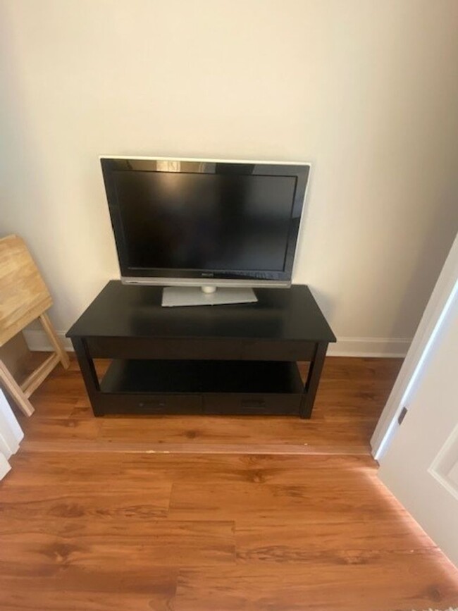 Building Photo - Nicely furnished garage apartment in gated...