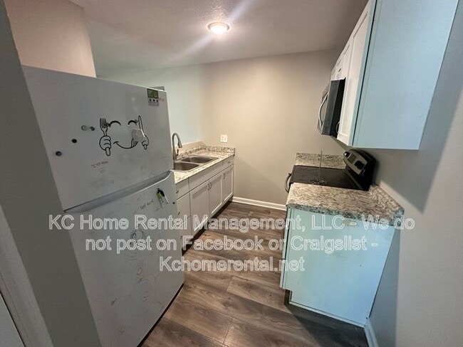 Building Photo - 4140 E 60 Terrace