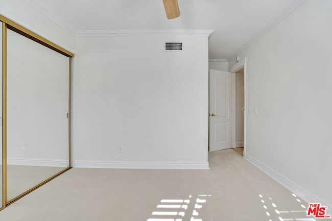 Building Photo - 10945 Cozycroft Ave