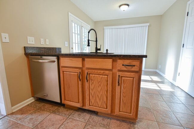 Building Photo - Pet Friendly Three Bedroom with Bonus!