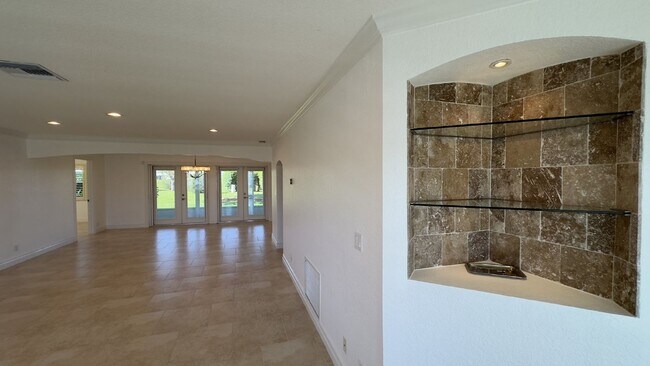 Building Photo - Lakefront 2BR Home in 55+ Leisureville Community