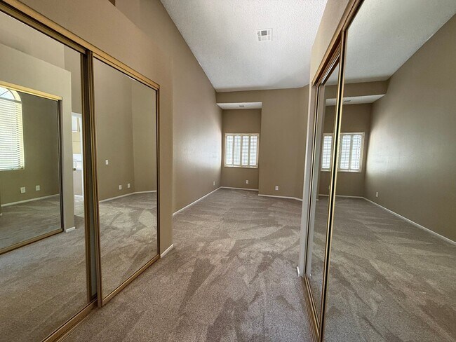 Building Photo - TWO BEDROOM TOWNHOME IN THE LAKES WITH GARAGE AND ATTACHED CARPORT