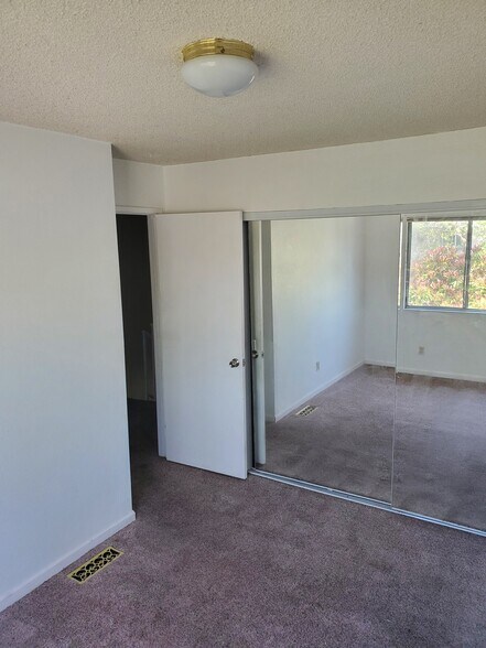 Smaller bedroom upstairs. - 1710 Oldfield Way