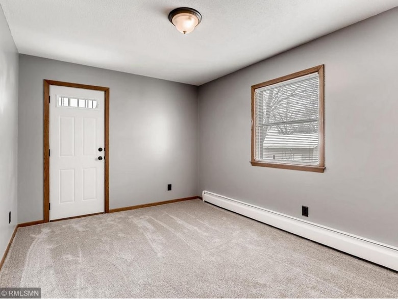 bedroom with balcony door shown - 136 7th Ave S