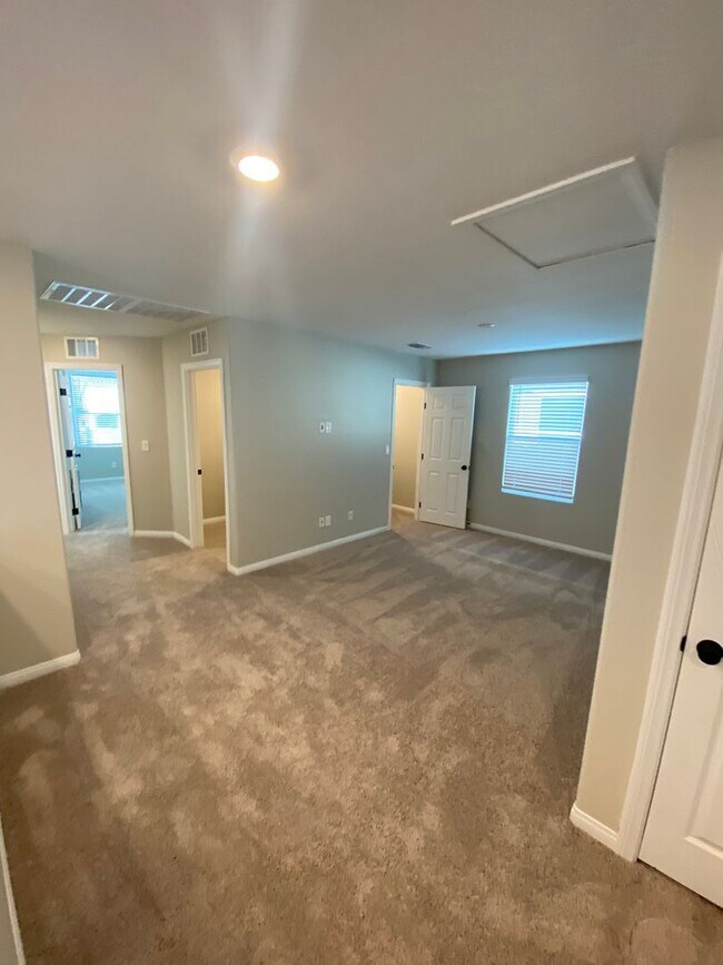 Building Photo - Americana Property Mgmt - 2022 built 4 bedrooms in prime South West Las Vegas