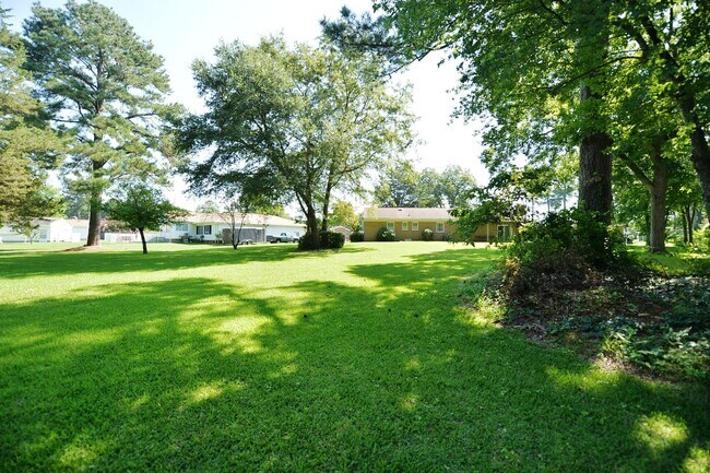 Building Photo - STUNNING 3 BEDROOM RANCH WATERFRONT HOME ON 1 ACRE W/ 1 CAR GARAGE!!