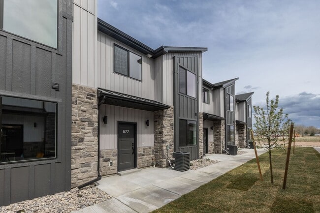Building Photo - $500 off first month - BRAND NEW 3 BED 2.5 BATH TOWNHOMES WITH 2 CAR GARAGE