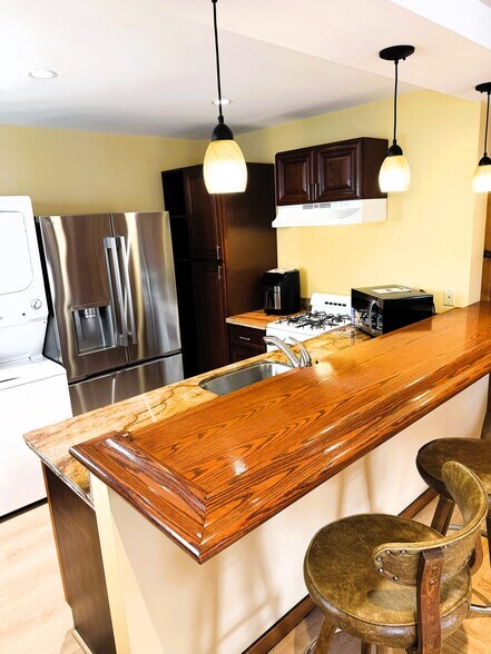 Hardwood Bar and Quartz countertops - 2919 23rd Ave