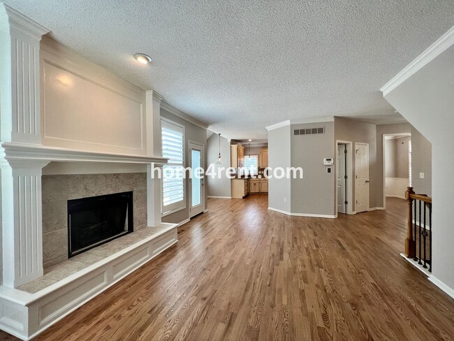 Building Photo - Updated Kitchen, Large Two Tiered Deck, Finished Basement in Blue Valley Schools!