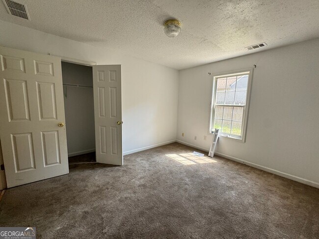 Building Photo - 6922 Red Bone Way