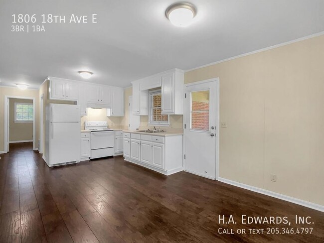 Building Photo - 1806 18th E Ave