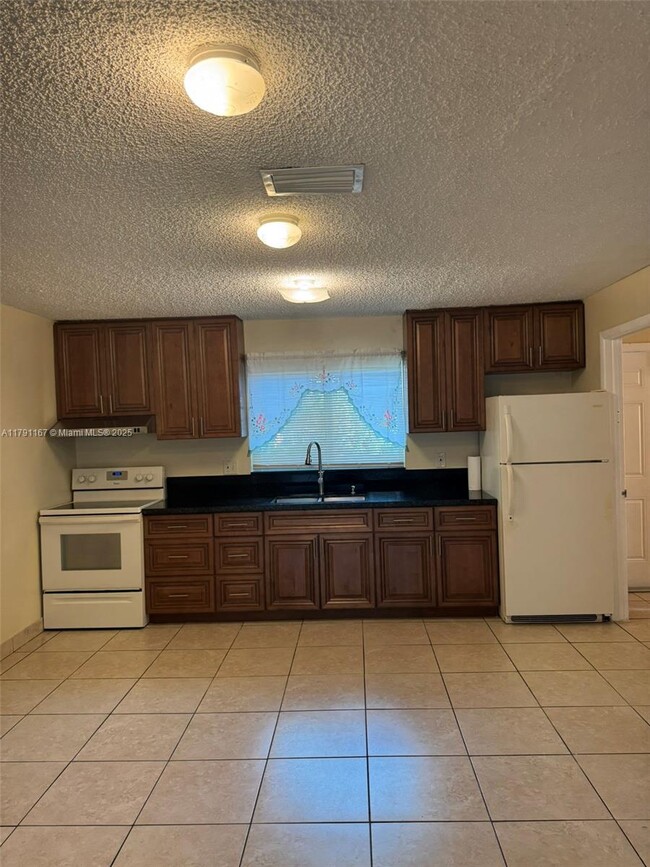 Building Photo - 312 N 62nd Ave