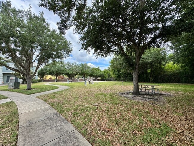 Building Photo - Fully Furnished 5-Bed End-Unit Townhome with Hot Tub in Gated Coral Cay! WASHER & DRYER INCLUDED!
