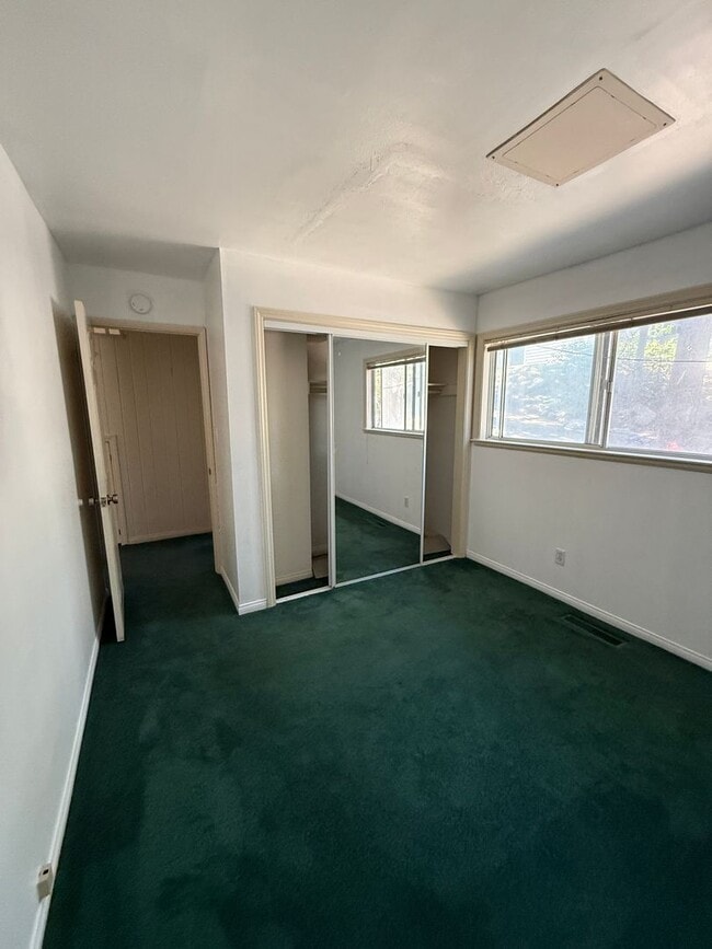 Building Photo - 3 Bed, 2 Bath Townhome with Vaulted Ceilings & Private Balcony