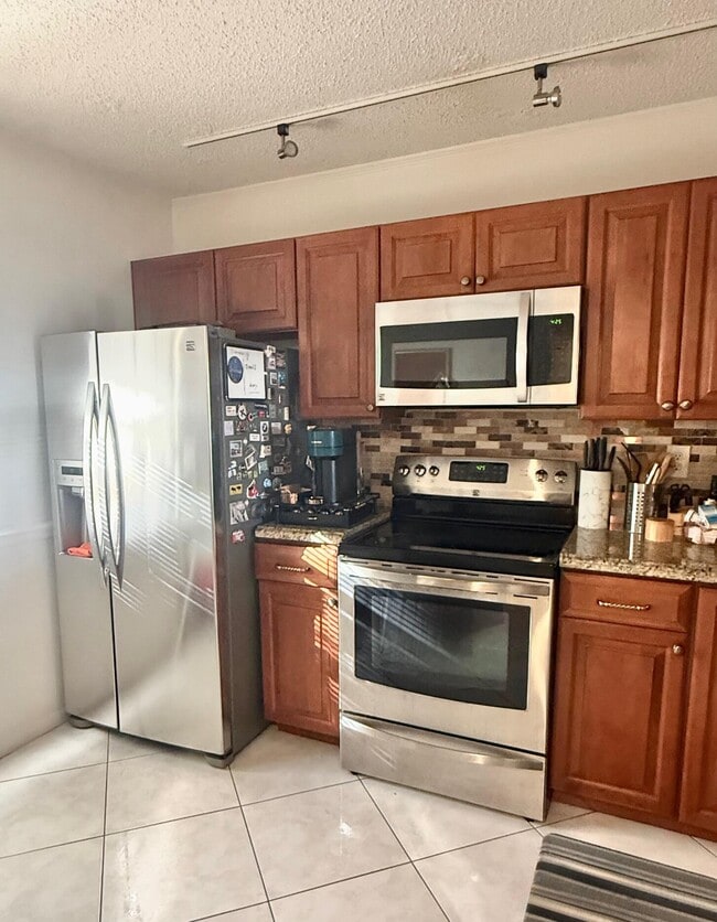 Building Photo - 3050 NW 42nd Ave