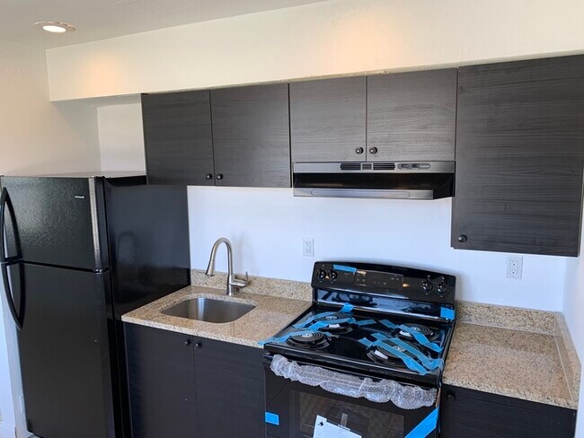 Building Photo - RENOVATED KITCHEN......GRANITE COUNTER TOP...