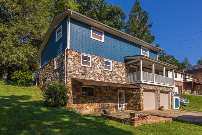 Back of Home with Ample Parking Spaces - 275 Kimberly Ave