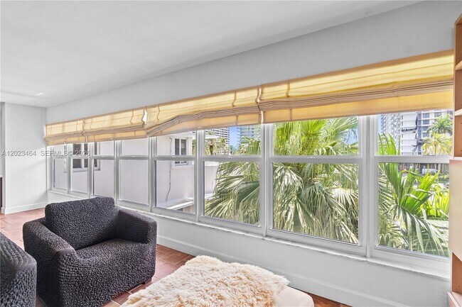 Building Photo - 10190 Collins Ave