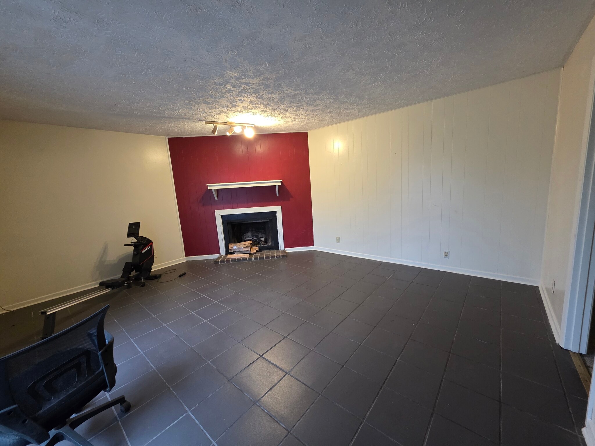 Living room with fire place. - 9102 Woodpark Ln