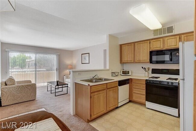 Building Photo - 5710 E Tropicana Ave