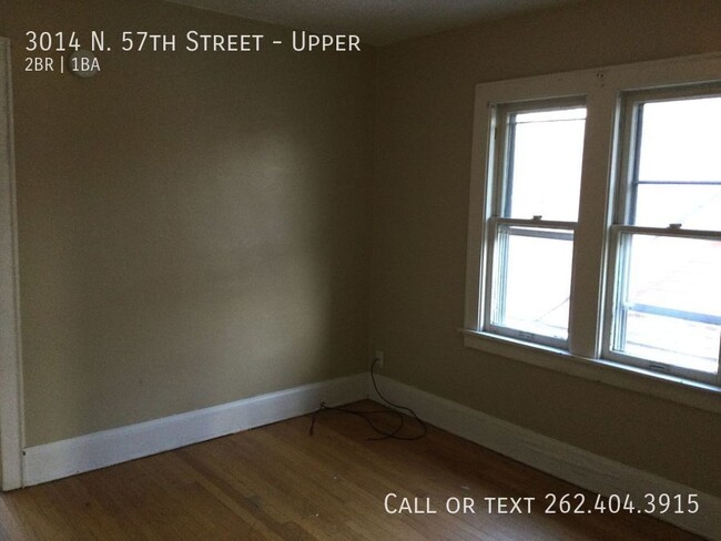 Building Photo - Three Bedroom Spacious Upper Duplex