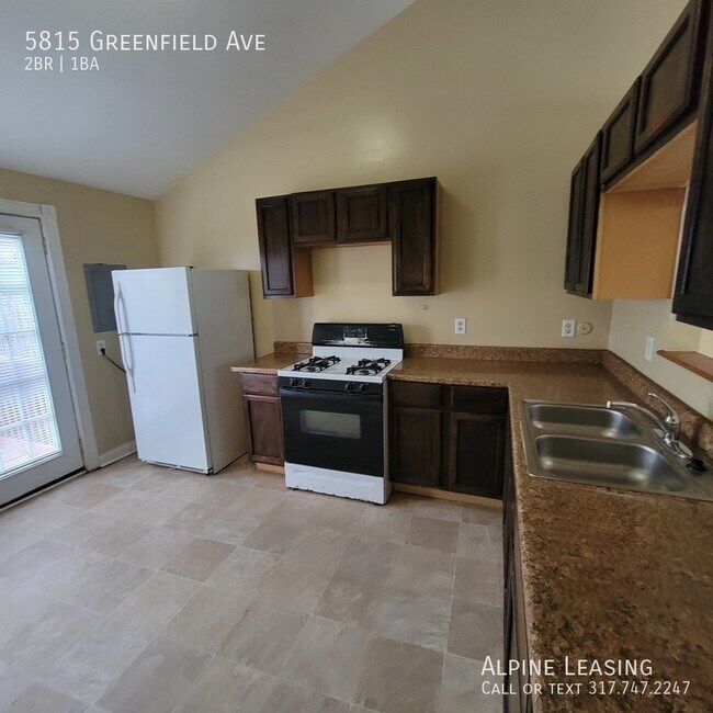 Building Photo - with back deck & garage/workshop combo (ha...