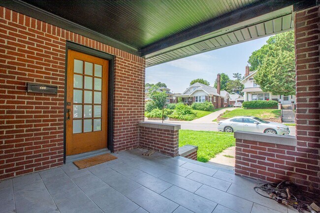 Building Photo - Adorable Brick 4 Bedroom Ranch with Finish...