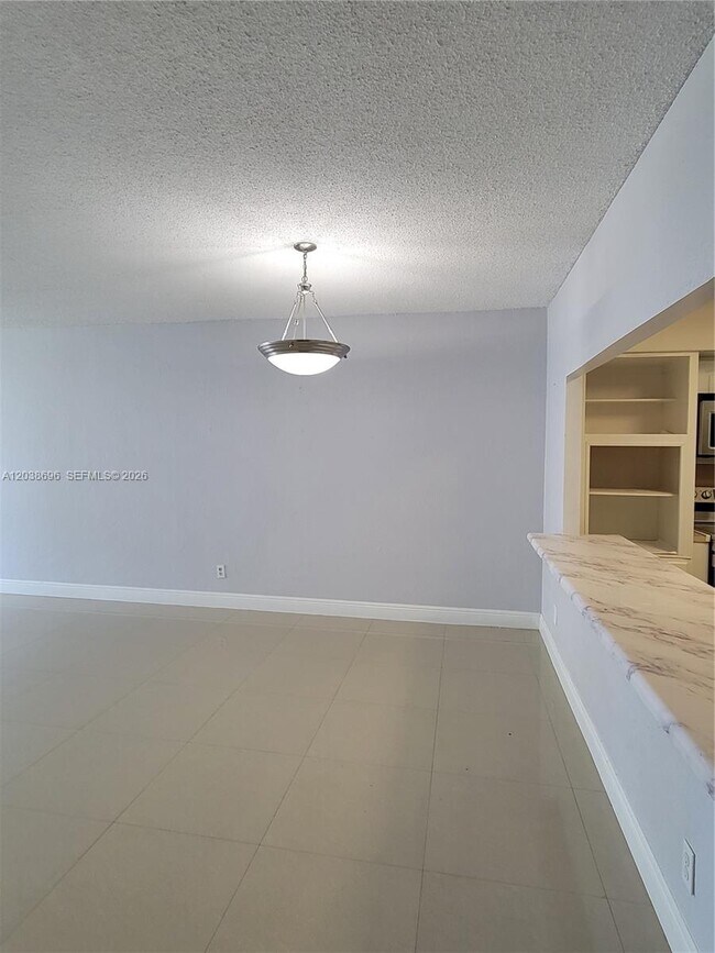 Building Photo - 19380 Collins Ave