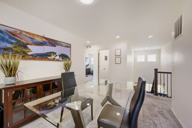 Building Photo - Stunning & Contemporary 4-Bedroom Home on Open Space-Available July 1st!