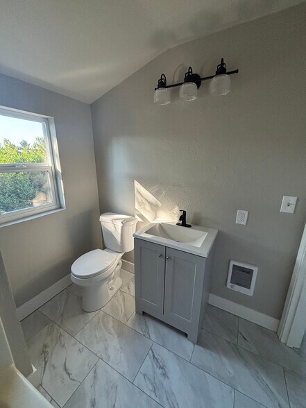 Building Photo - 8015 N John Ave