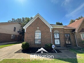 Building Photo - STANDOUT MEMPHIS RENTAL! 3BR/2BA | High Ceilings & Brick Fireplace | Fenced Yard!
