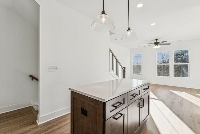 Building Photo - High-End 2BR Townhome | Rooftop Terrace + 2-Car Garage | 24-Unit Commnity