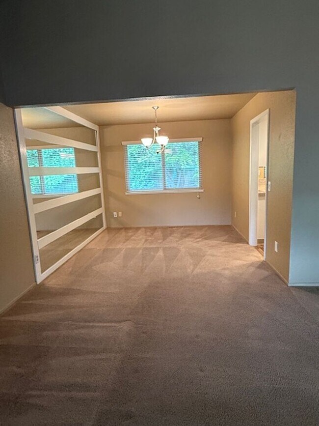 Building Photo - OPEN HOUSE this Wednesday 5pm-6:30pm - Private Redwood Setting | 4BR Home with Family Room, Bar &...